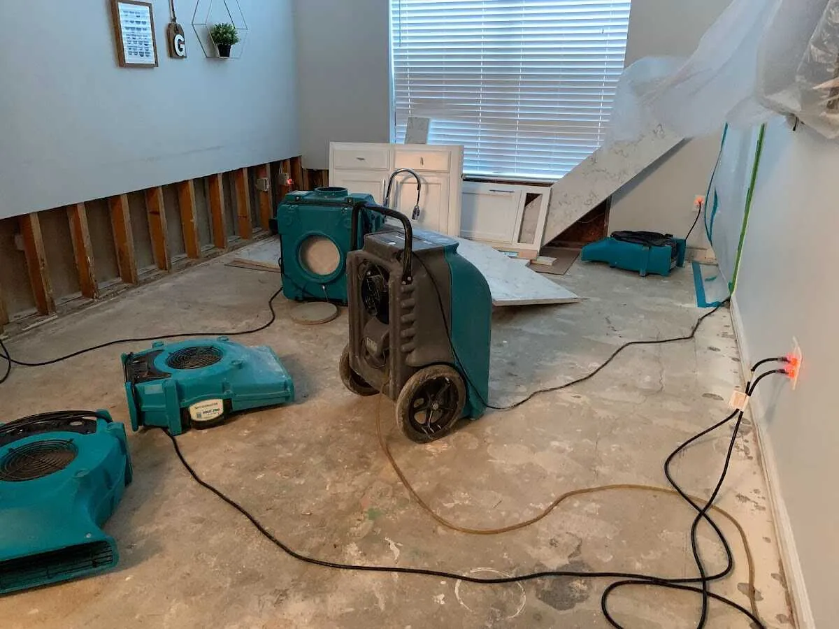 Dehumidifier in flood-cut room for Water Extraction & Removal in Selma
