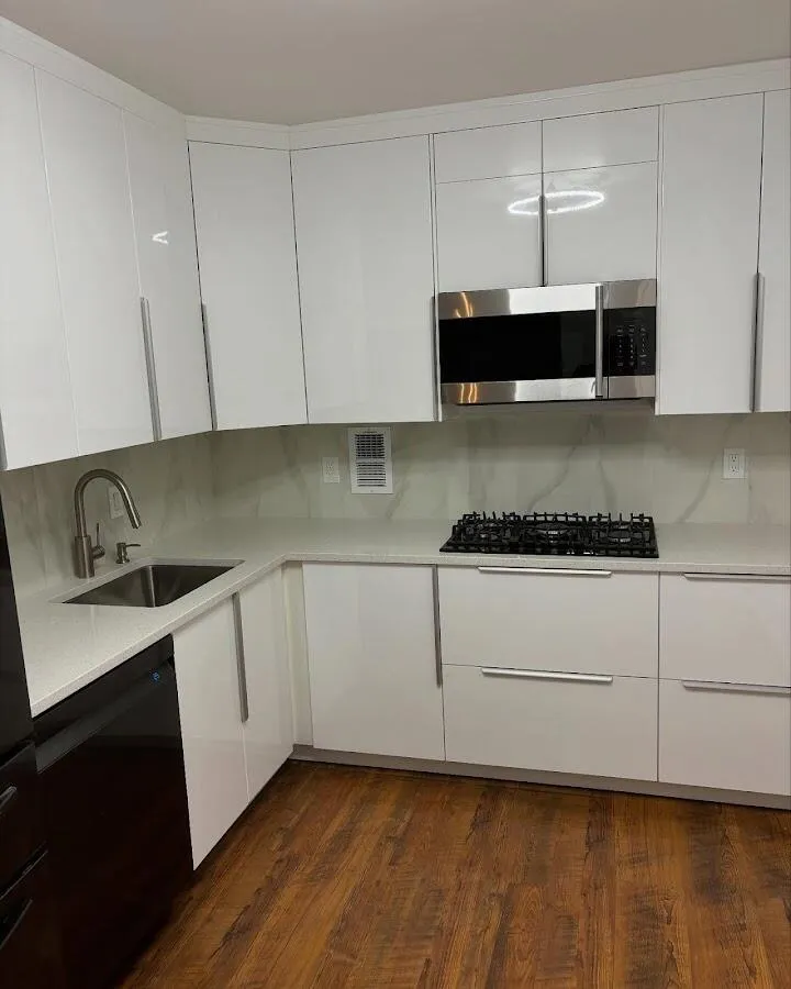 Restored kitchen with white cabinets after water damage in Selma